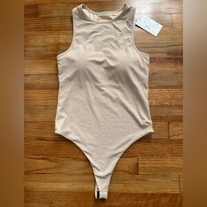 Klassy Network Light Tan Ribbed Bodysuit